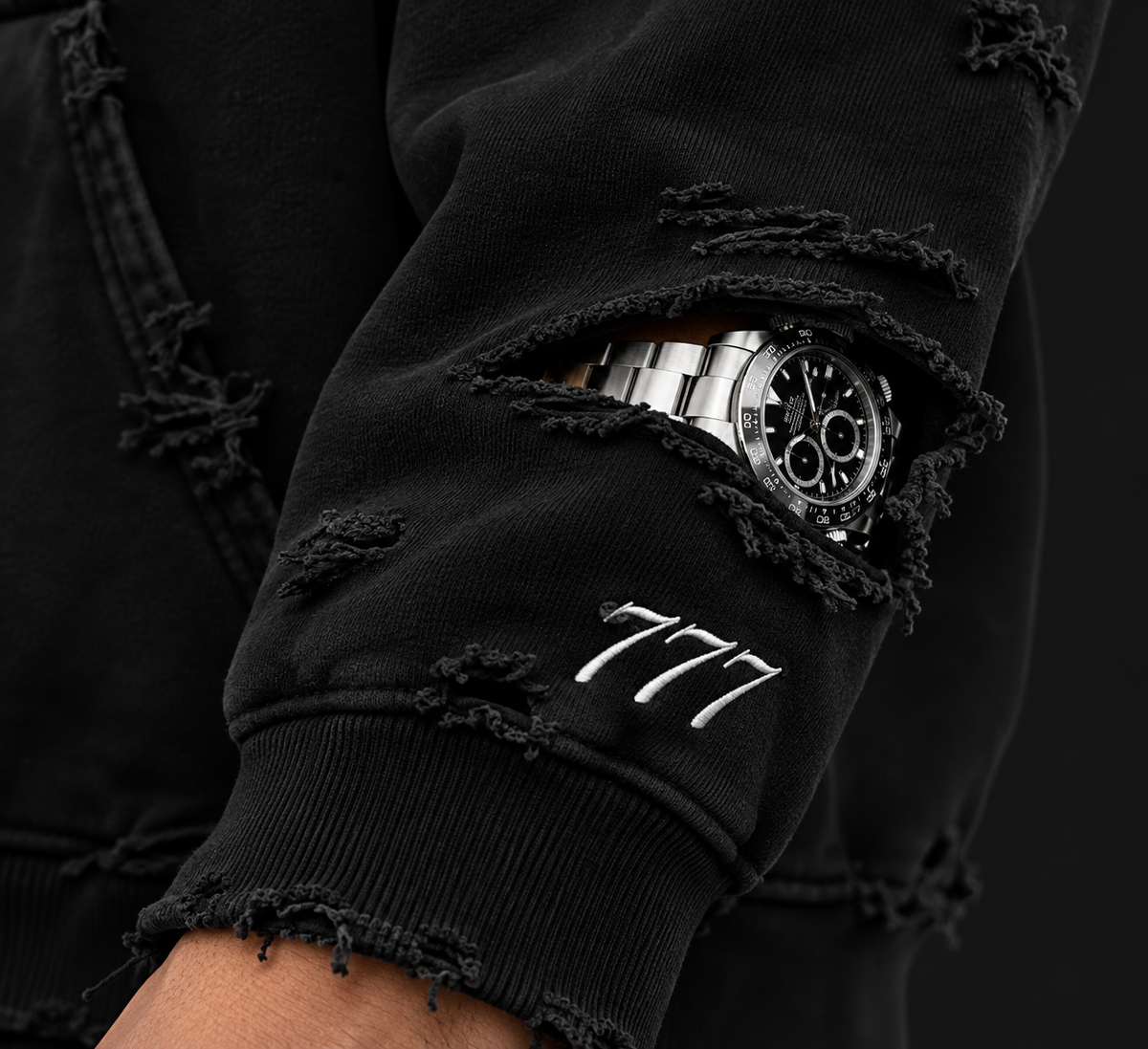 777 Timeless Hoodie – sleeve cutout and 777 embroidery